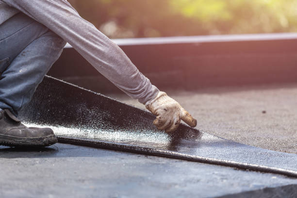 Professional Basement Waterproofing technician working in East Setauket, NY